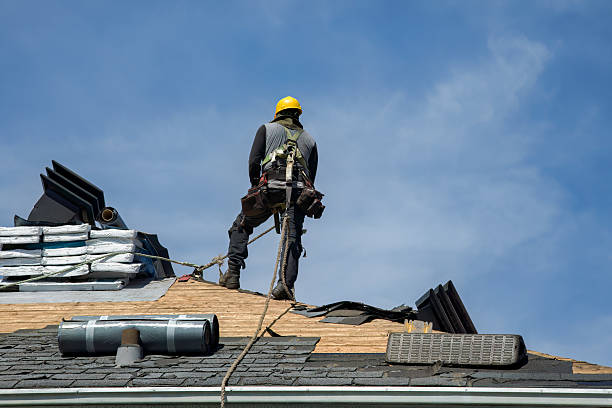 Professional Roof Replacement technician working in Tecumseh, KS